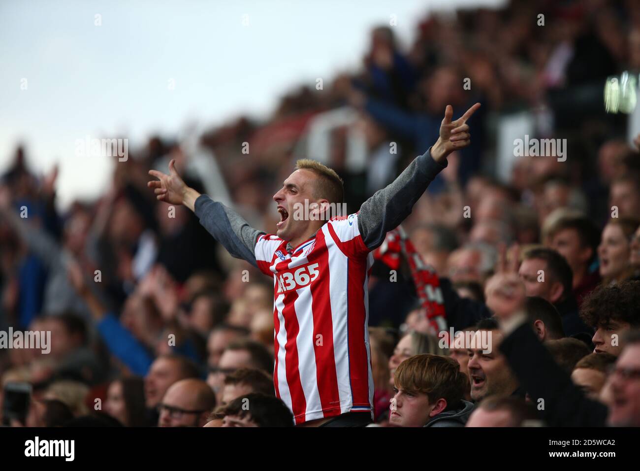 Stoke City fans in the stands Stock Photo