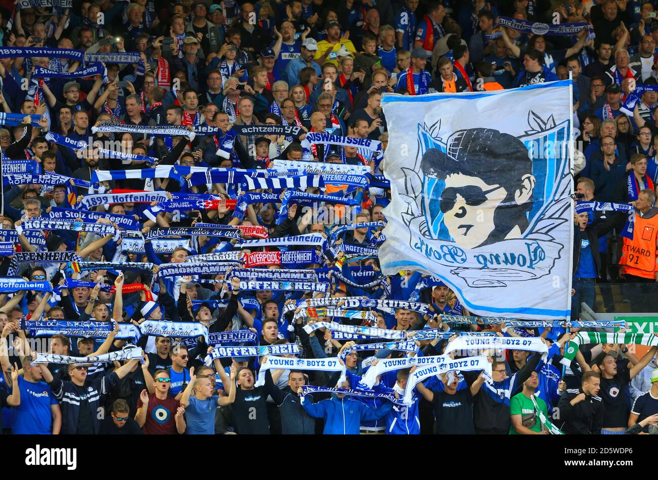 Hoffenheim fans wave flags in the stands Stock Photo - Alamy