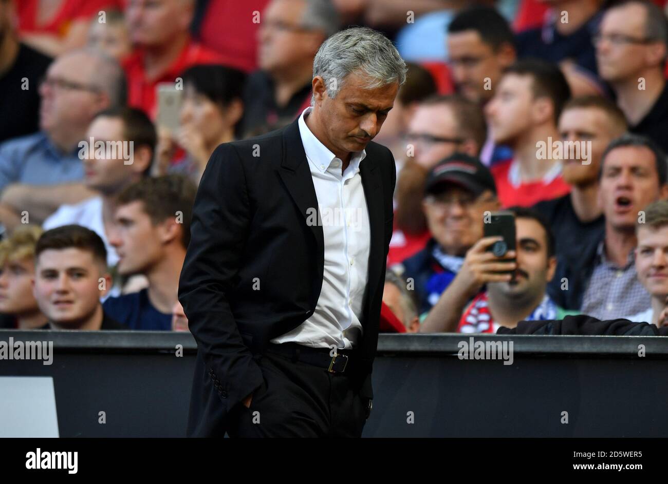 Manchester United manager Jose Mourinho heads back down the tunnel at half time  Stock Photo