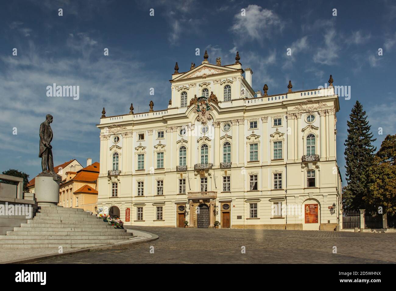 Prague,Czech Republic - September 16,2020. Empty street and the Archbishop Palace near Prague Castle.Facade decorated in Rococo style. No tourists dur Stock Photo