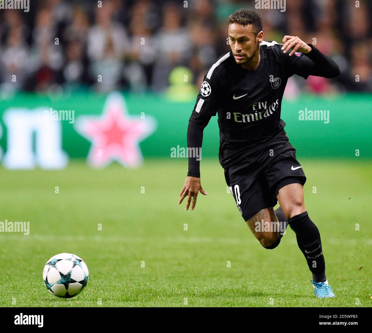 Paris Saint-Germain's Neymar wears Liverpool goalkeeper Alisson Becker's  top after the match Stock Photo - Alamy