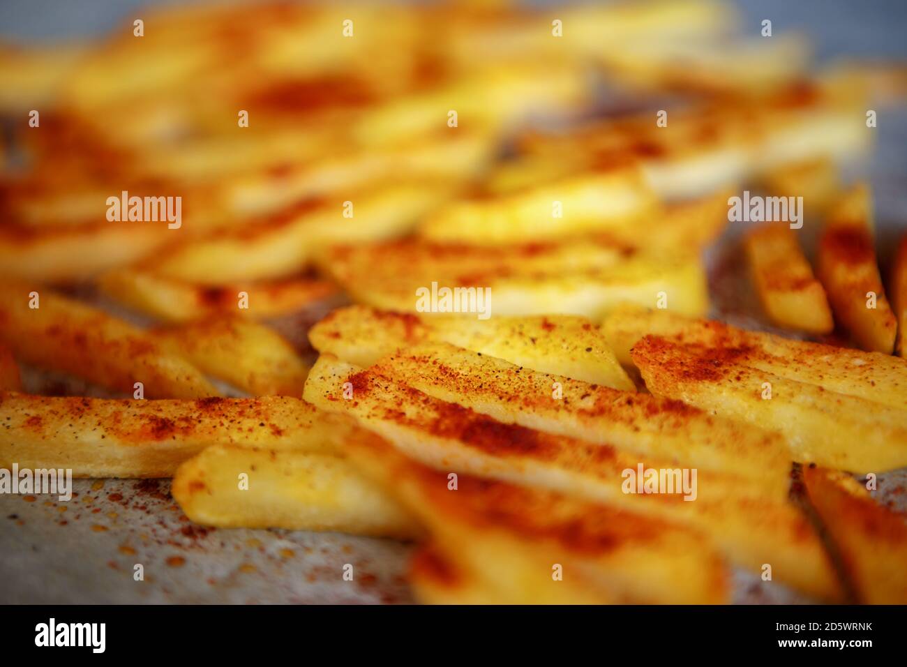 French fries baked in oven with smoked paprika spice powder.Delicious