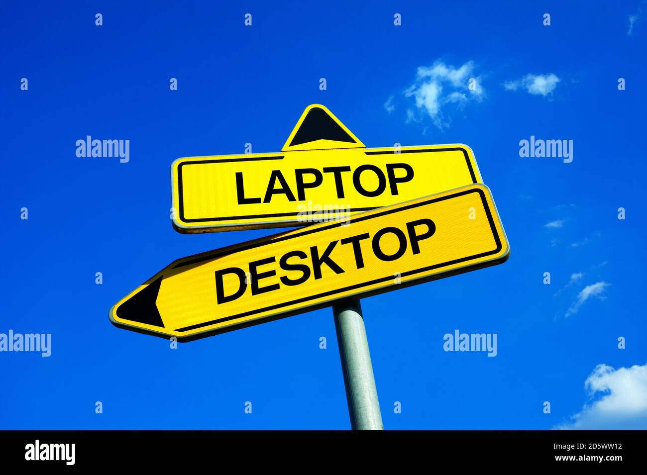 Laptop vs Desktop - Traffic sign with two options - using unportable personal computer or working on portable and mobile notebook. Question of weight, Stock Photo