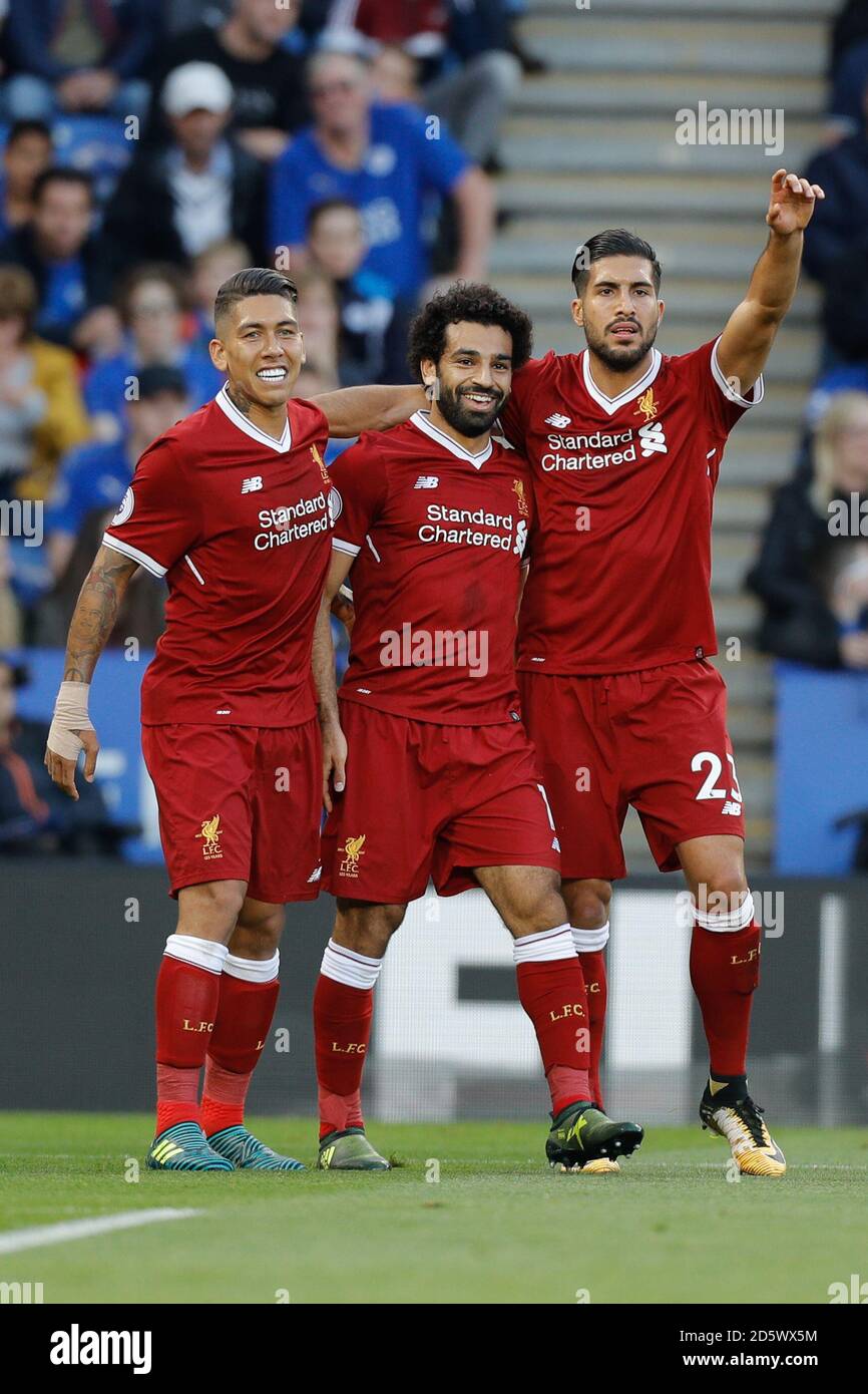 Liverpool's Roberto Firmino, Mohamed Salah and Emre Chan celebrate