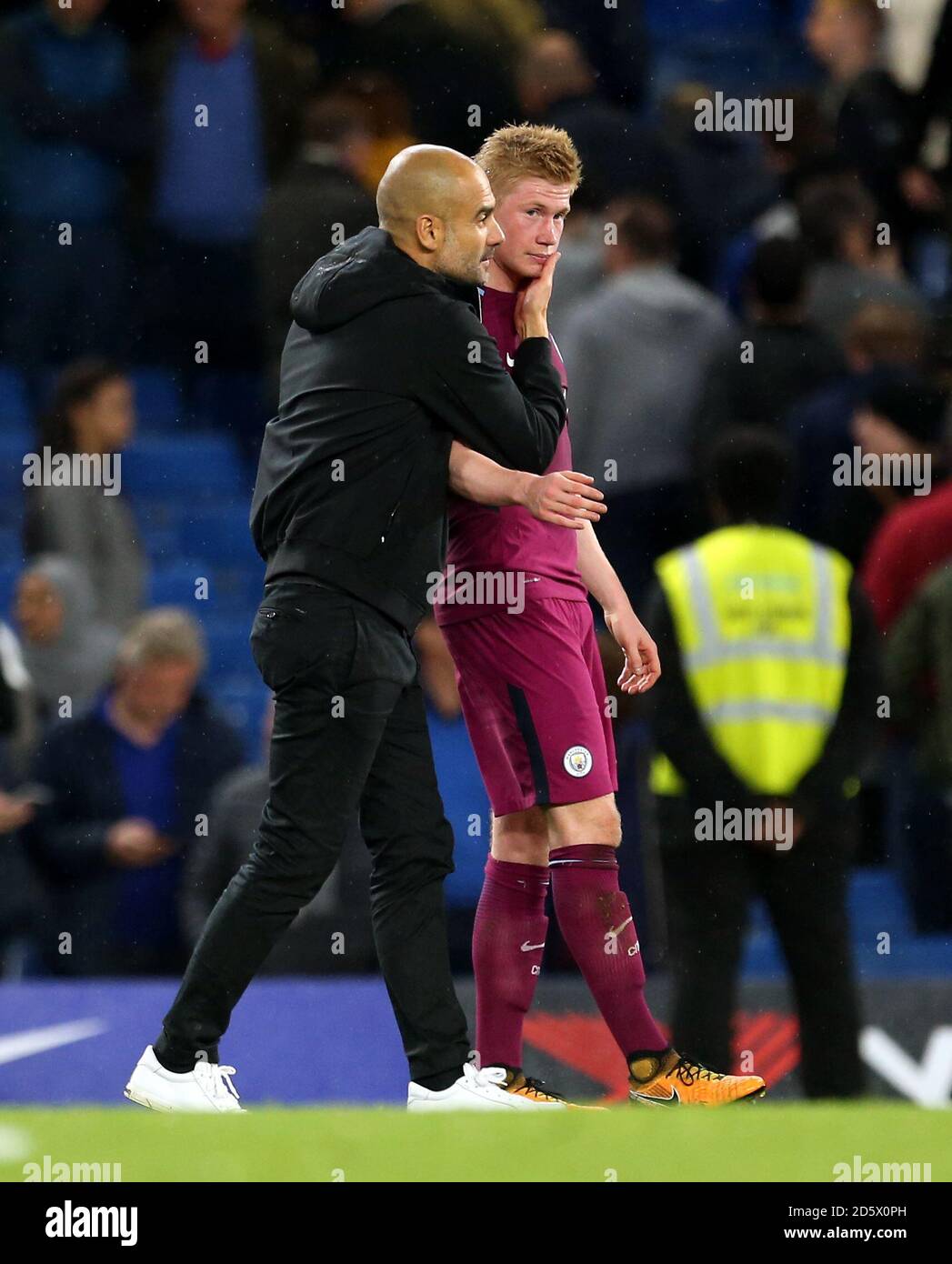 Manchester City manager Pep Guardiola and Kevin De Bruyne after the