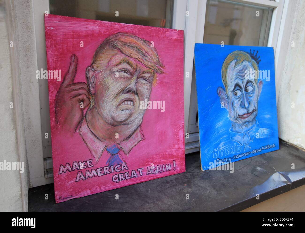 Artwork of Vladimir Putin and Donald Trump for sale during the 2018 FIFA World Cup Qualifying Group F match at the LFF Stadium, Vilnius. PRESS ASSOCIATION Photo. Picture date: Sunday October 8, 2017. See PA story SOCCER Lithuania. Photo credit should read: Mike Egerton/PA Wire. RESTRICTIONS: Use subject to FA restrictions. Editorial use only. Commercial use only with prior written consent of the FA. No editing except cropping. Stock Photo