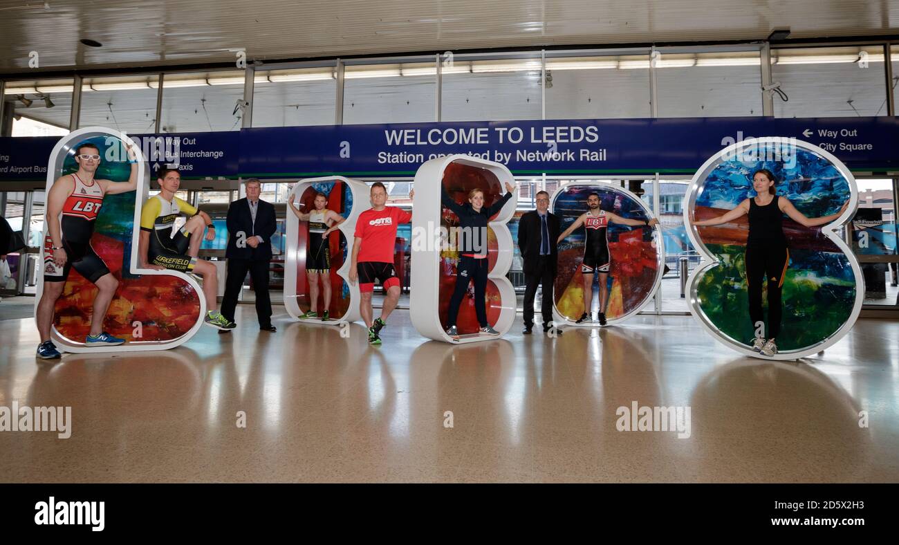 British Triathlete Jess Learmonth (centre) alongside Wayne Coyle event director and Councillor Lewis, deputy leader of Leeds City Council and local triathletes launch entries at Leeds station for the ITU World Triathlon Leeds 2018 Stock Photo