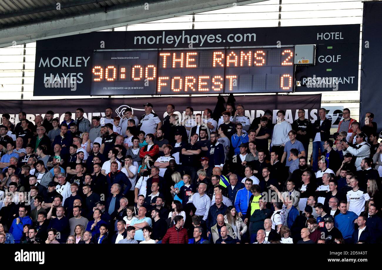 A general view of Derby County fans in the stand and the scoreboard reading 2 Forest 0' - Alamy