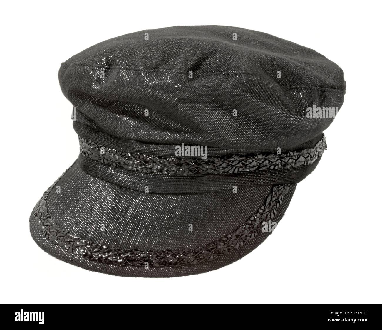 Vintage style conductor hat by Lola in shiny black photographed on a white background . Stock Photo
