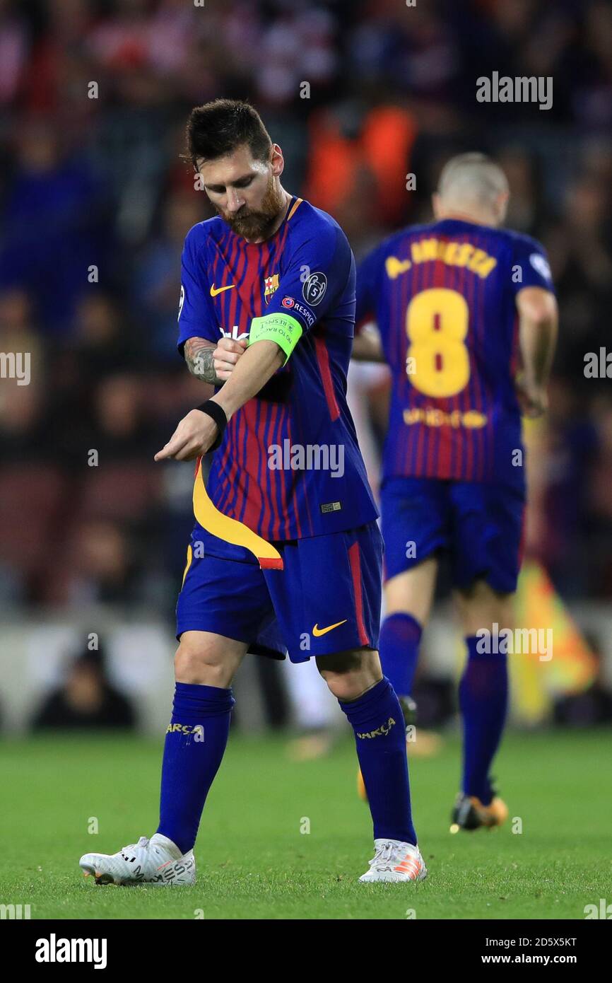 Barcelona's Lionel Messi puts on the captain's armband Stock Photo Alamy