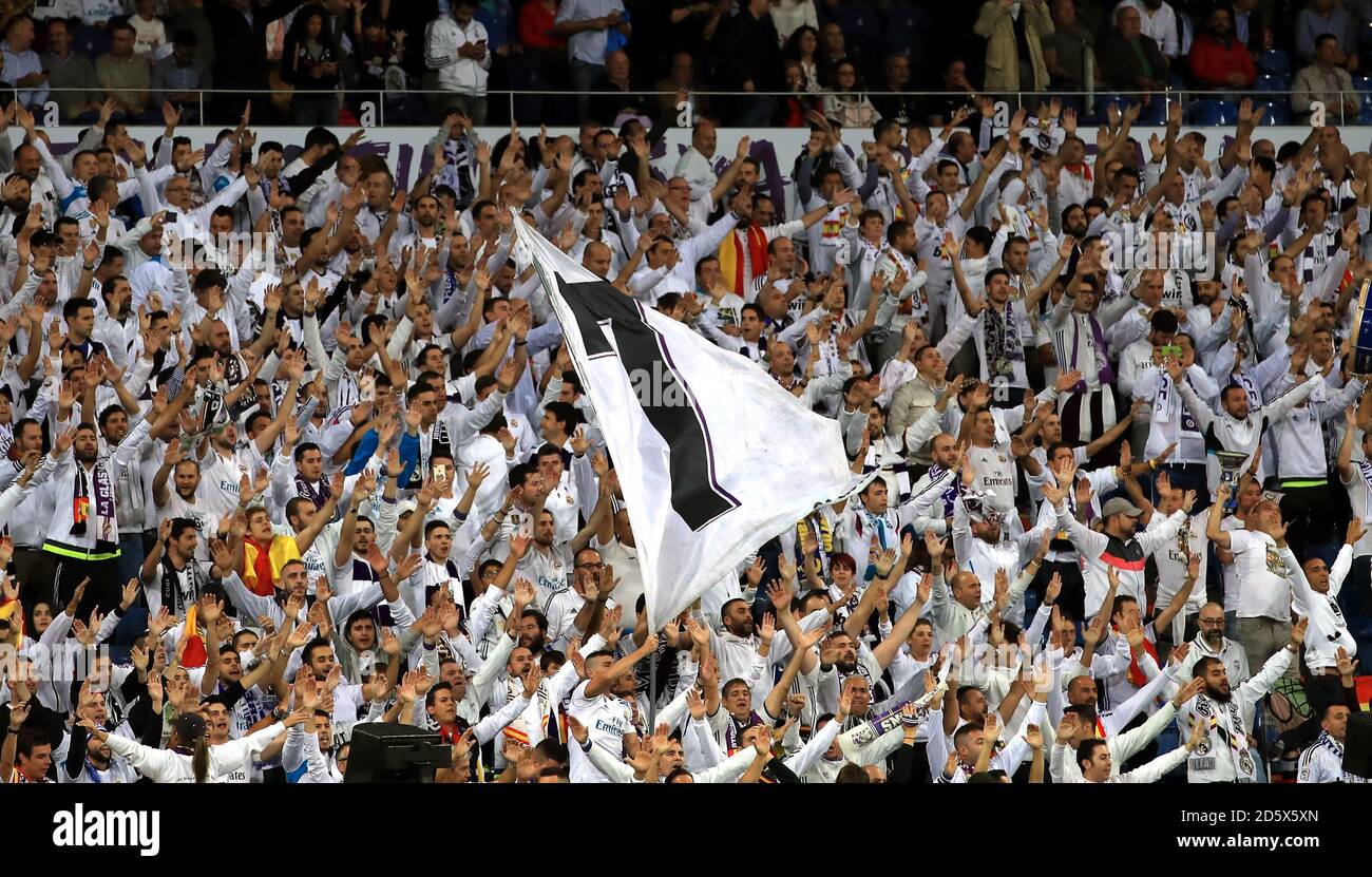 Real Madrid fans show their support in the stands Stock Photo Alamy