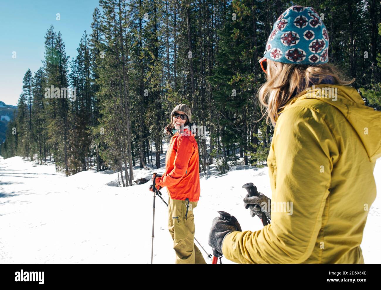 Two young women cross-country ski on Mt. Hood on a sunny day Stock ...