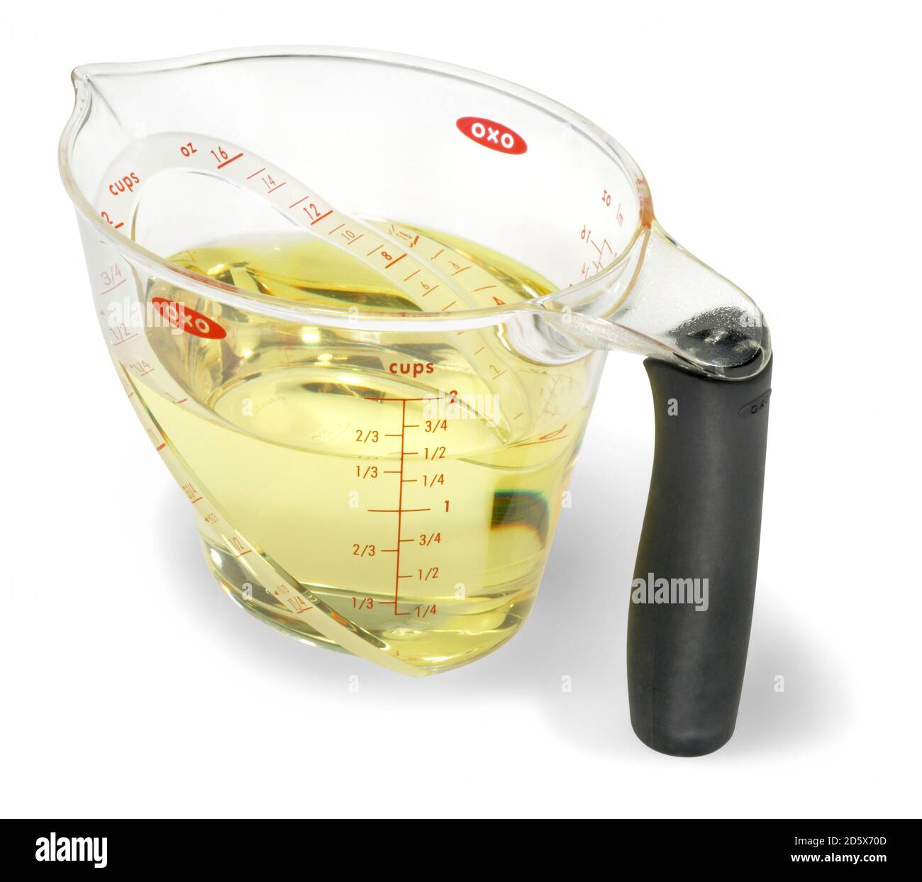 https://c8.alamy.com/comp/2D5X70D/oxo-brand-measuring-cup-filled-with-baking-oil-photographed-on-a-white-background-2D5X70D.jpg