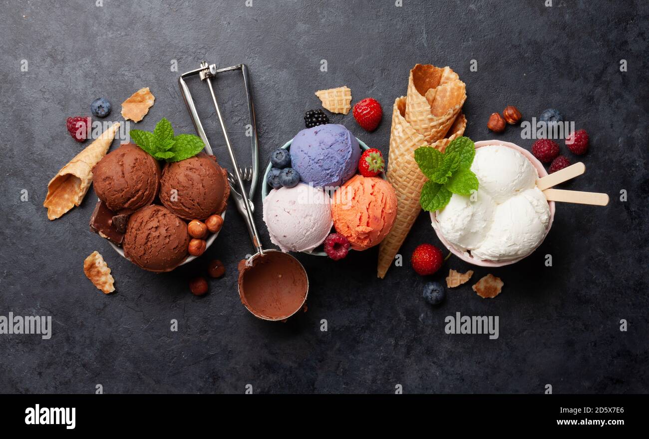 Premium Photo  Ice cream scoops with vanilla, chocolate and berry