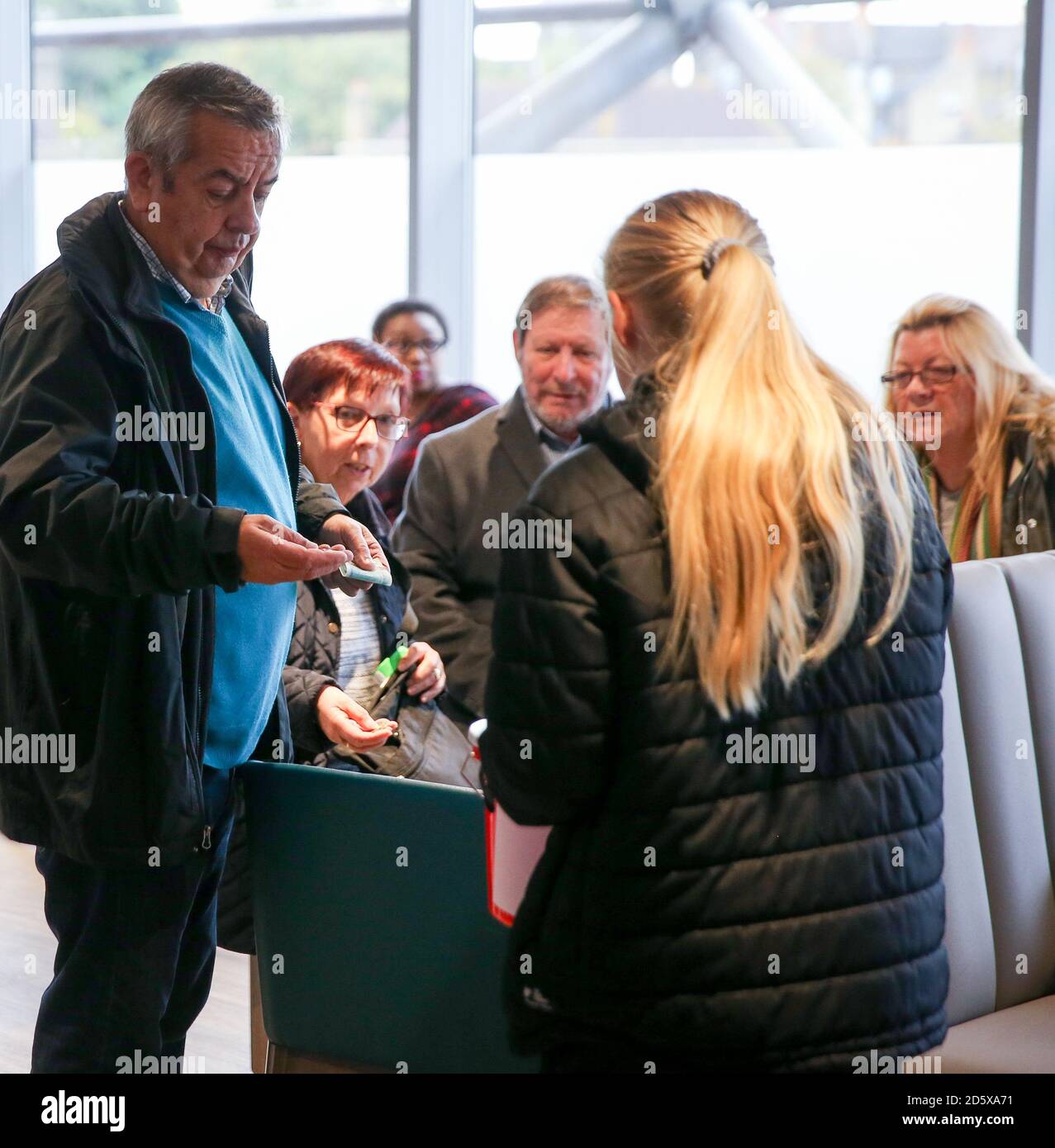 A bucket collection in the Vista Lounge Stock Photo - Alamy