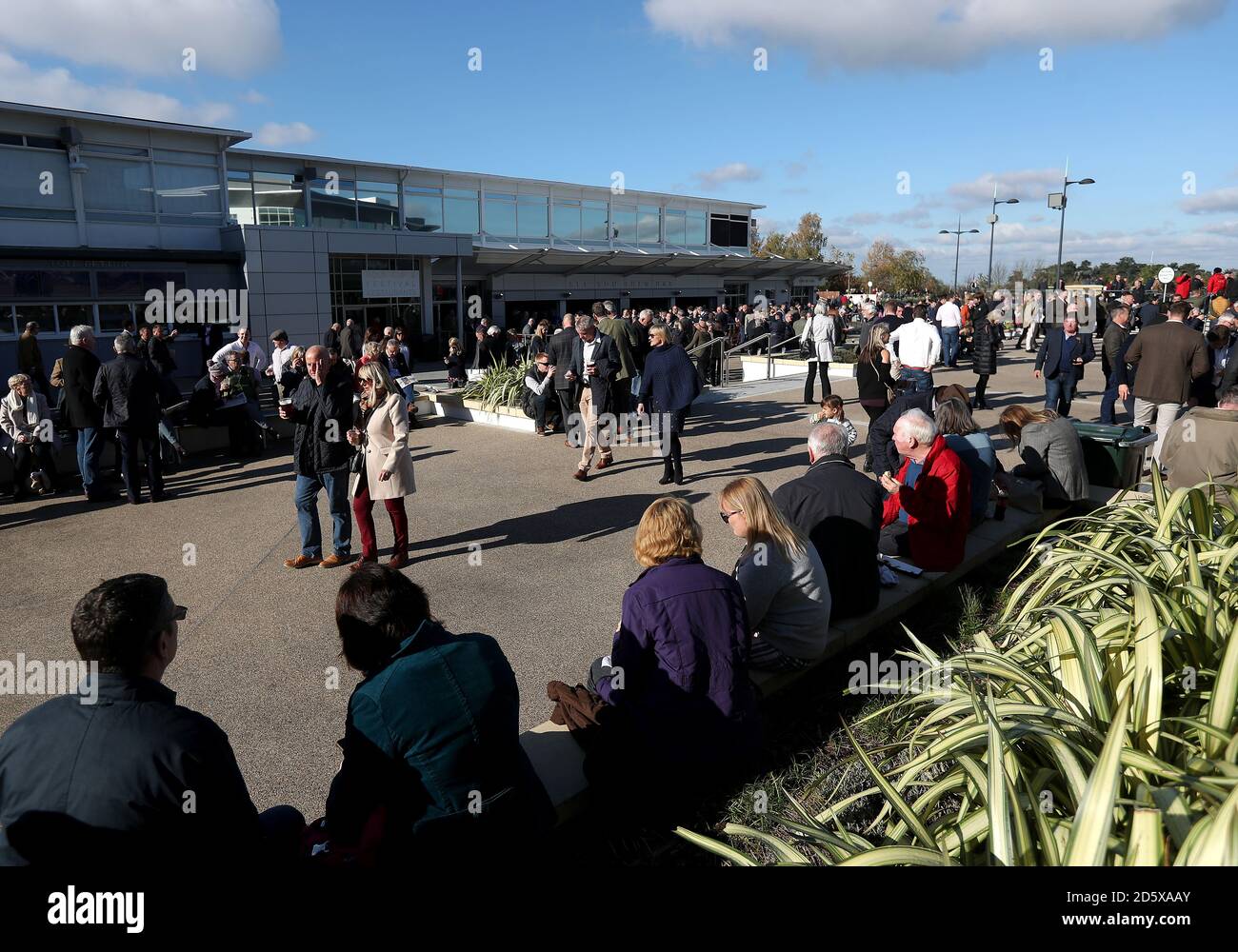 Racegoers outside the Gold Cup and Festival Restaurants during day one of the Showcase at Cheltenham Racecourse Stock Photo