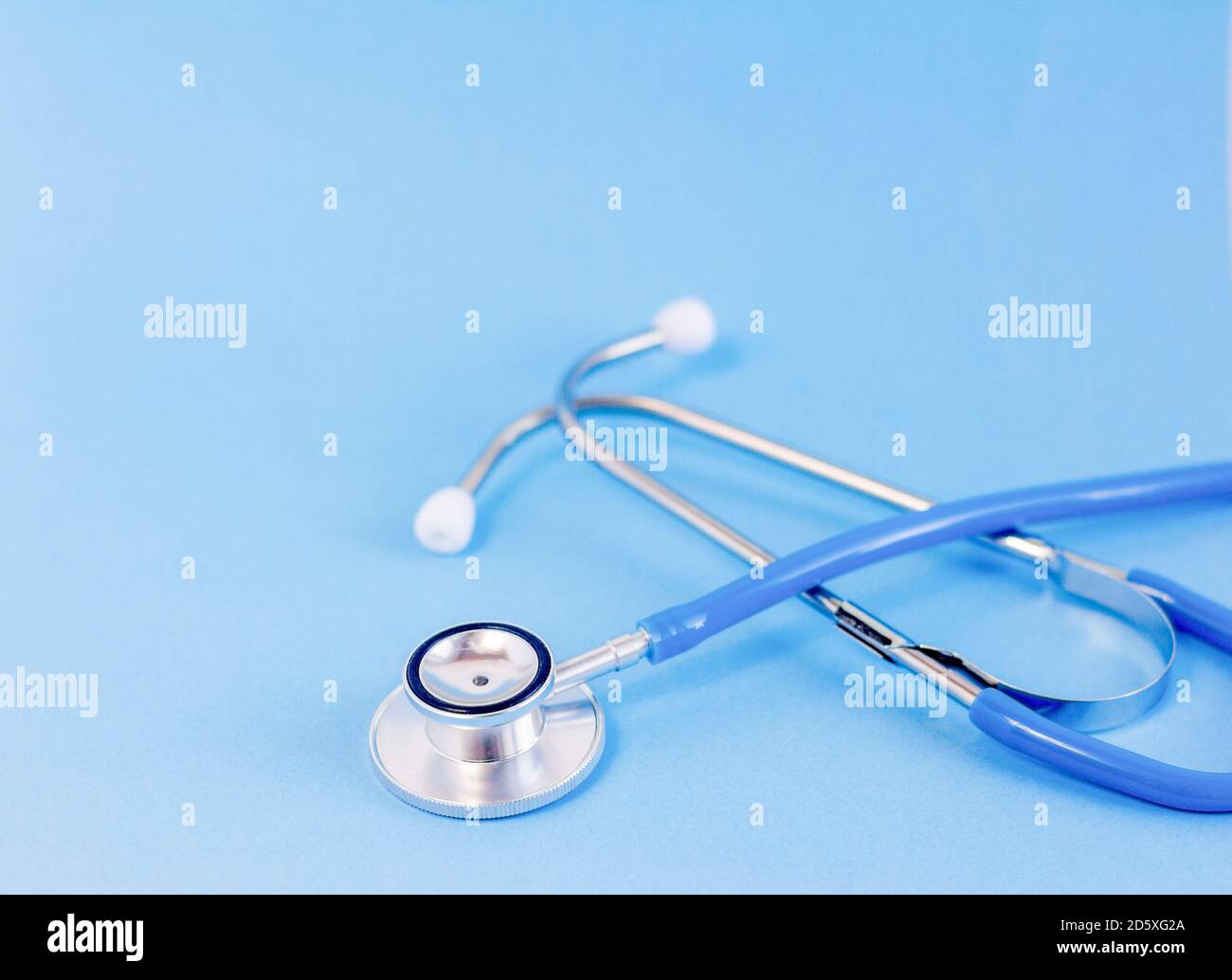 Blue Medical Stethoscope On A Blue Background close up Stock Photo Alamy blue-medical-stethoscope-on-a-blue-background-close-up-stock-photo-alamy