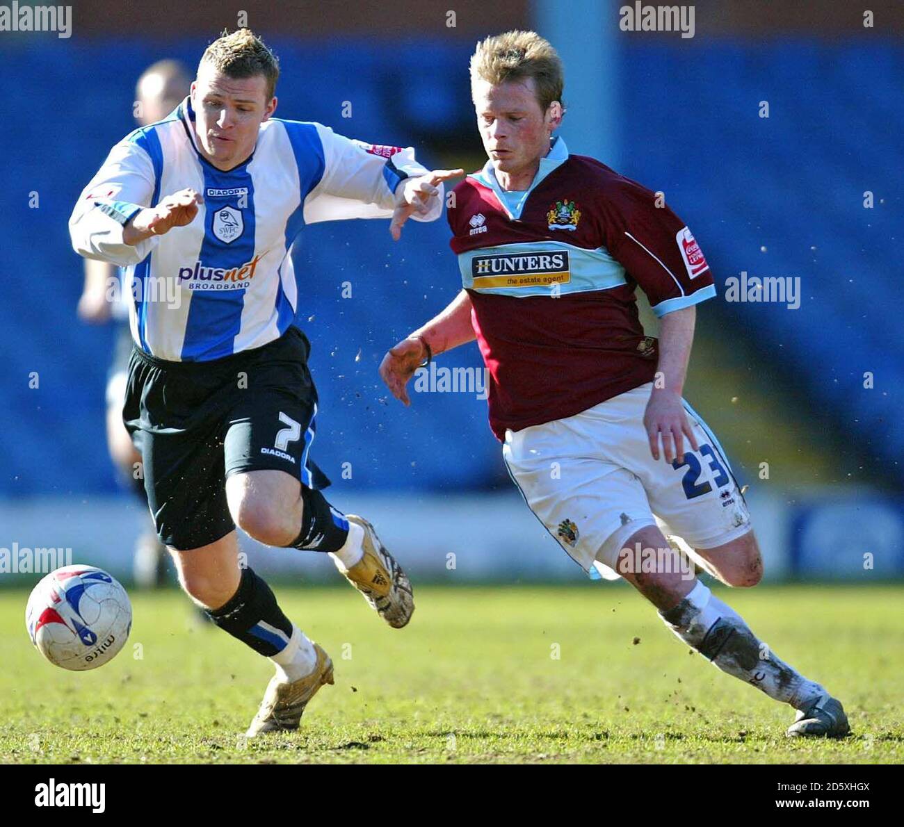 Sheffield Wednesday's Jon-Paul McGovern and Burnley's Alan Mahon battle for the ball Stock Photo