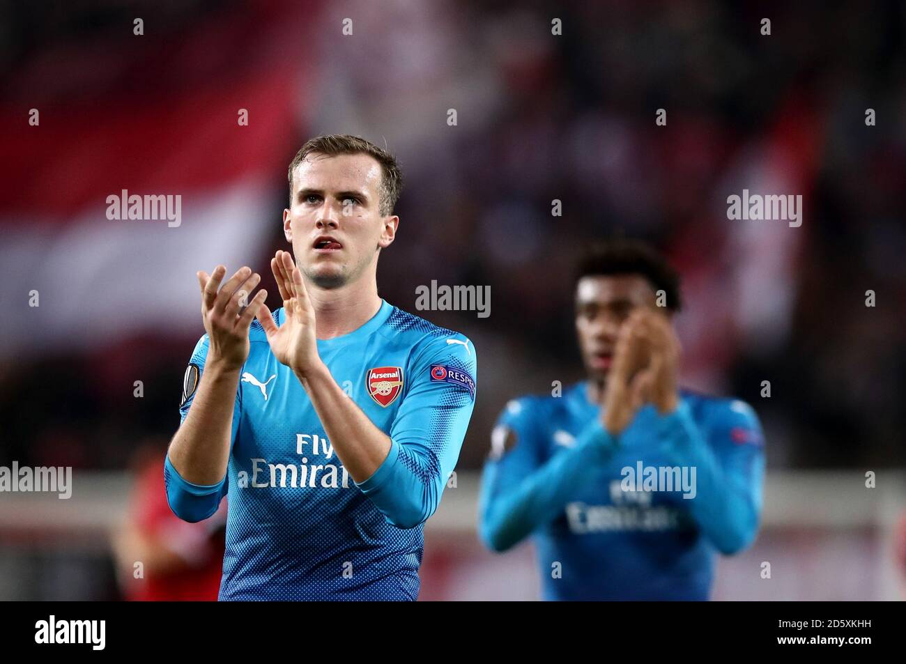 Arsenal's Rob Holding applauds the crowds after the final whistle Stock Photo