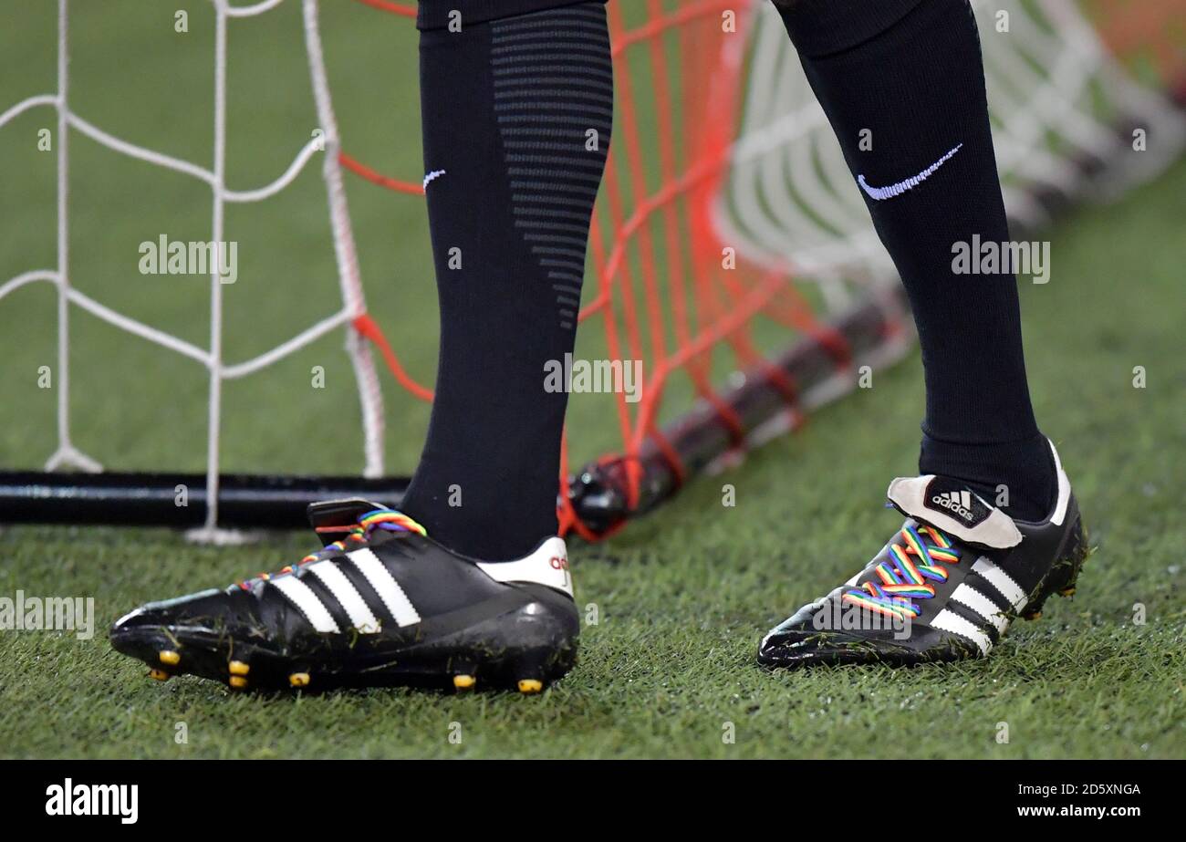 A referee with rainbow laces on his boots Stock Photo Alamy
