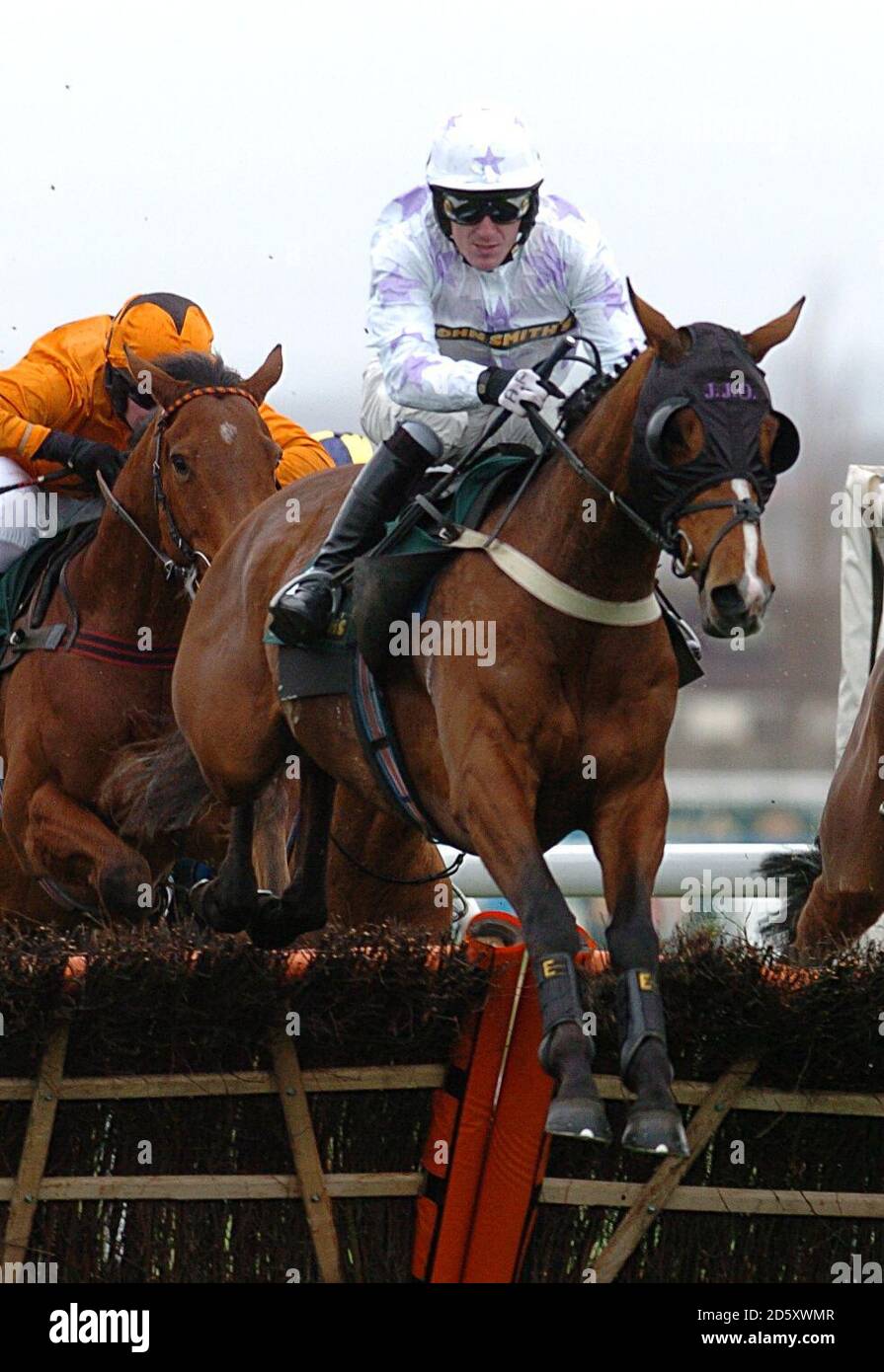 Fire Dragon ridden by Tony McCoy in the John Smith's and Flixton Conservative Club Liverpool Hurdle (Class 1) Stock Photo