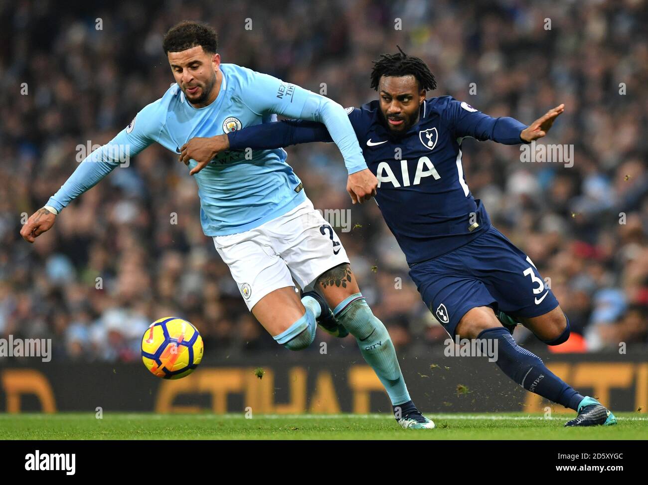 Manchester City's Kyle Walker (left) and Tottenham Hotspur's Danny Rose battle for the ball Stock Photo