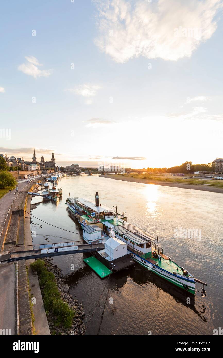 Germany, Dresden, Bruehl's Terrace with paddlesteamer on river Elbe at sunset Stock Photo