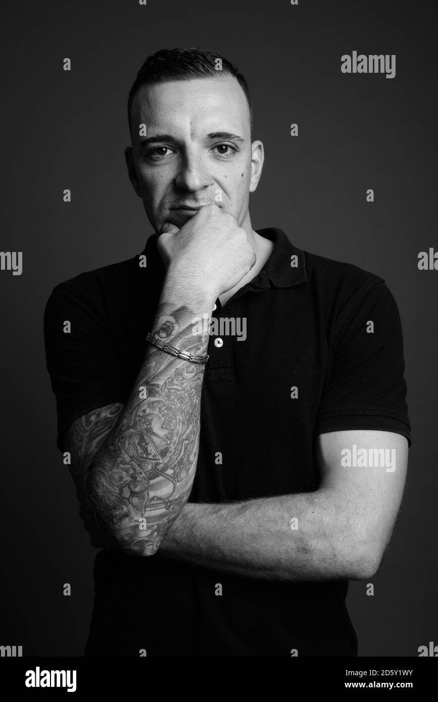 Man hand shirt Black and White Stock Photos & Images - Alamy