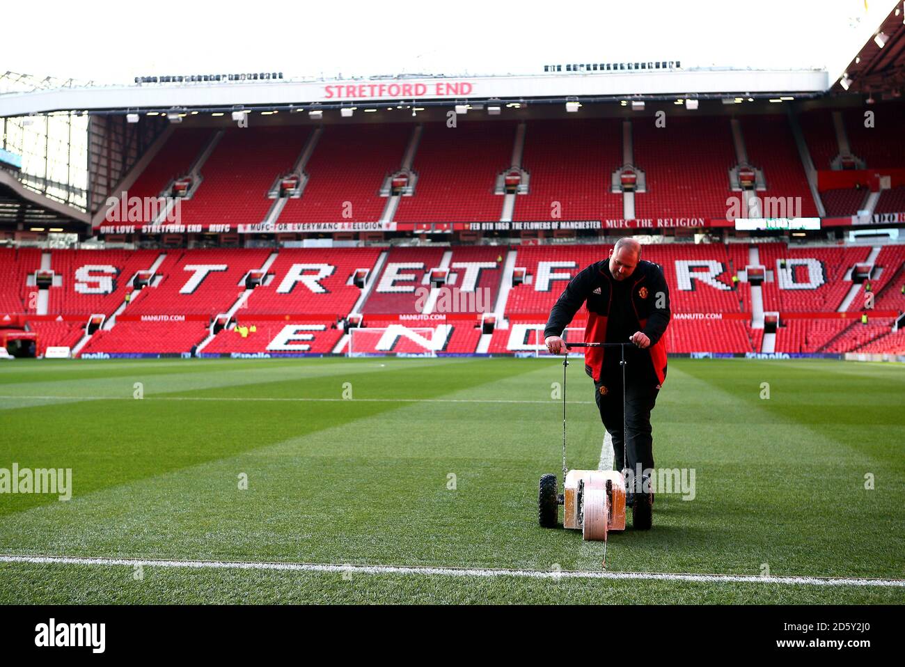 Pitch markings are made prior to the match Stock Photo Alamy