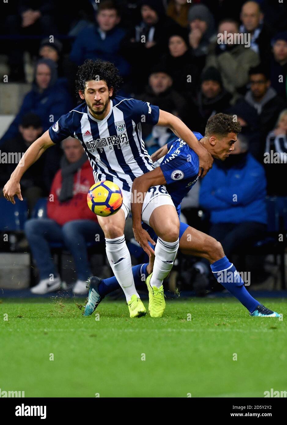 West Bromwich Albion's Ahmed Hegazy (left) and Everton's Dominic Calvert-Lewin compete for possession  Stock Photo