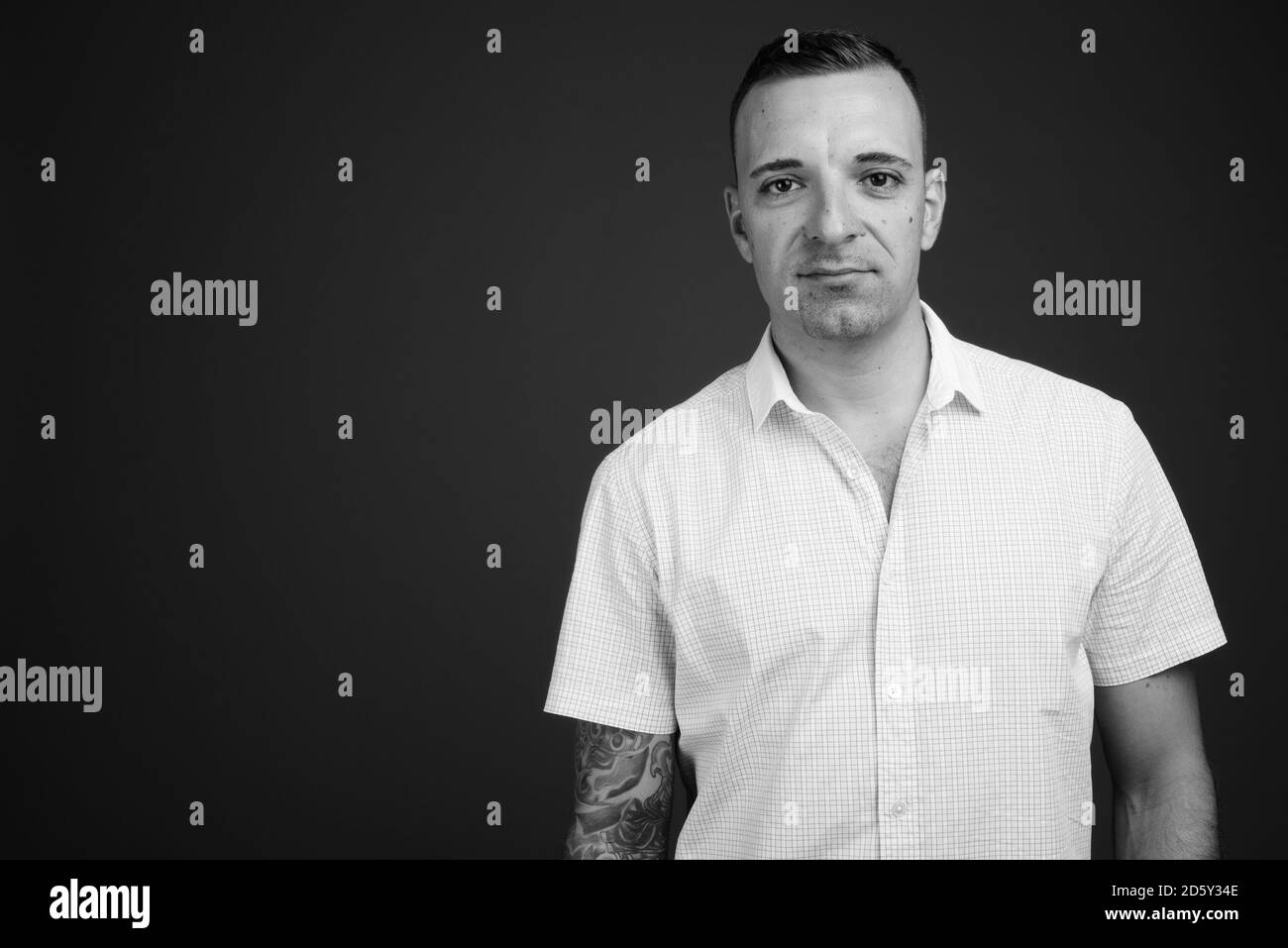 Man white background white shirt Black and White Stock Photos & Images ...