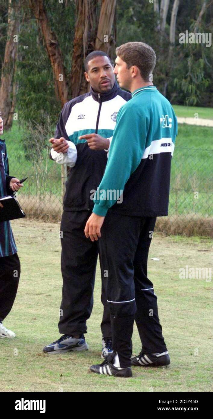 Celtic's Rafael discusses tactics with manager John Barnes before making his debut against Fortuna Dusseldorf.  Stock Photo