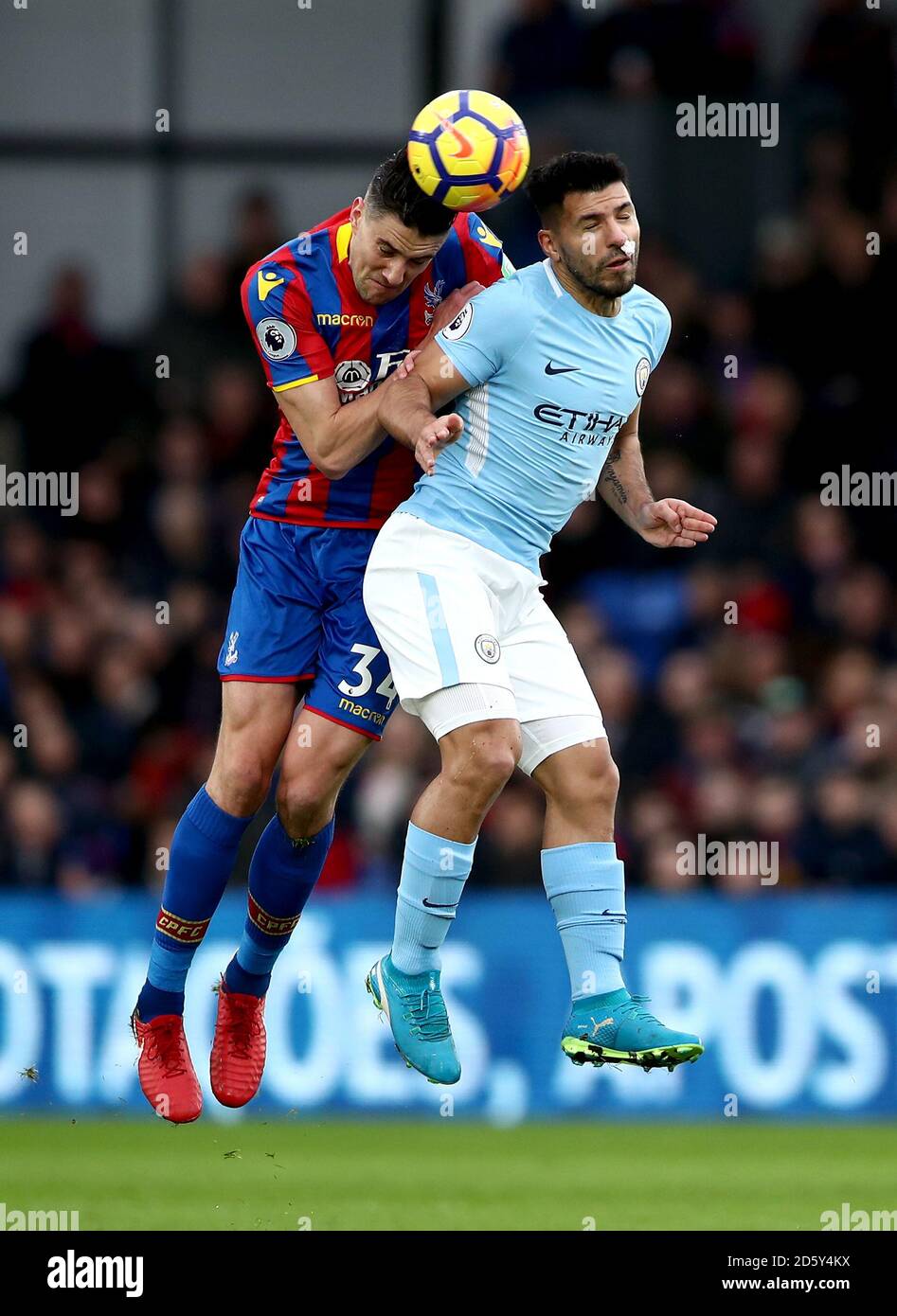 Crystal Palace's Martin Kelly (left) and Manchester City's Sergio Aguero (right) battle for the ball Stock Photo