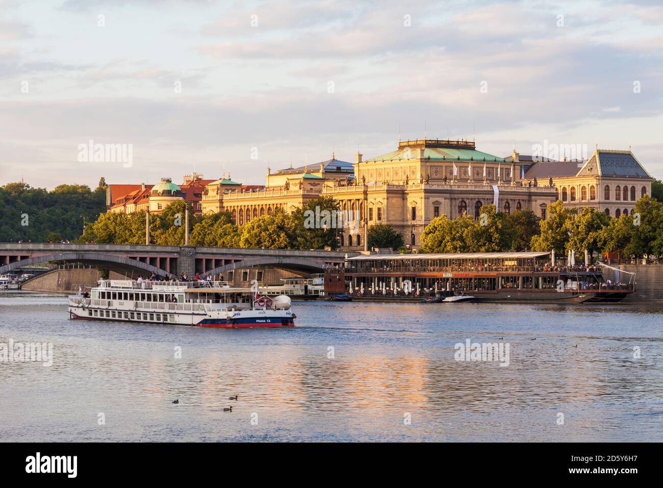 Czech Republic, Prague, tourboat on Vltava and Rudolfinum conchert hall and gallery building Stock Photo