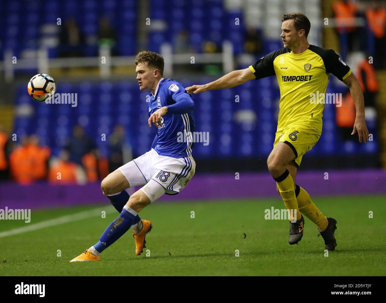 Birmingham City's goal scorer Sam Gallagher and Burton Albion's Ben Turner  battle for the ball Stock Photo - Alamy