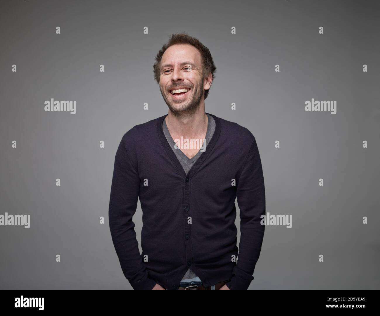 Studio laughing portrait man hi-res stock photography and images - Alamy