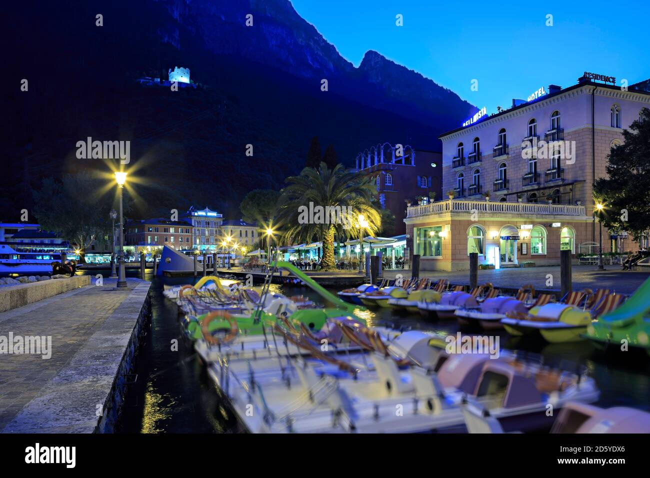 Italy, Riva del Garda, pedal boats on lake Garda Stock Photo Alamy