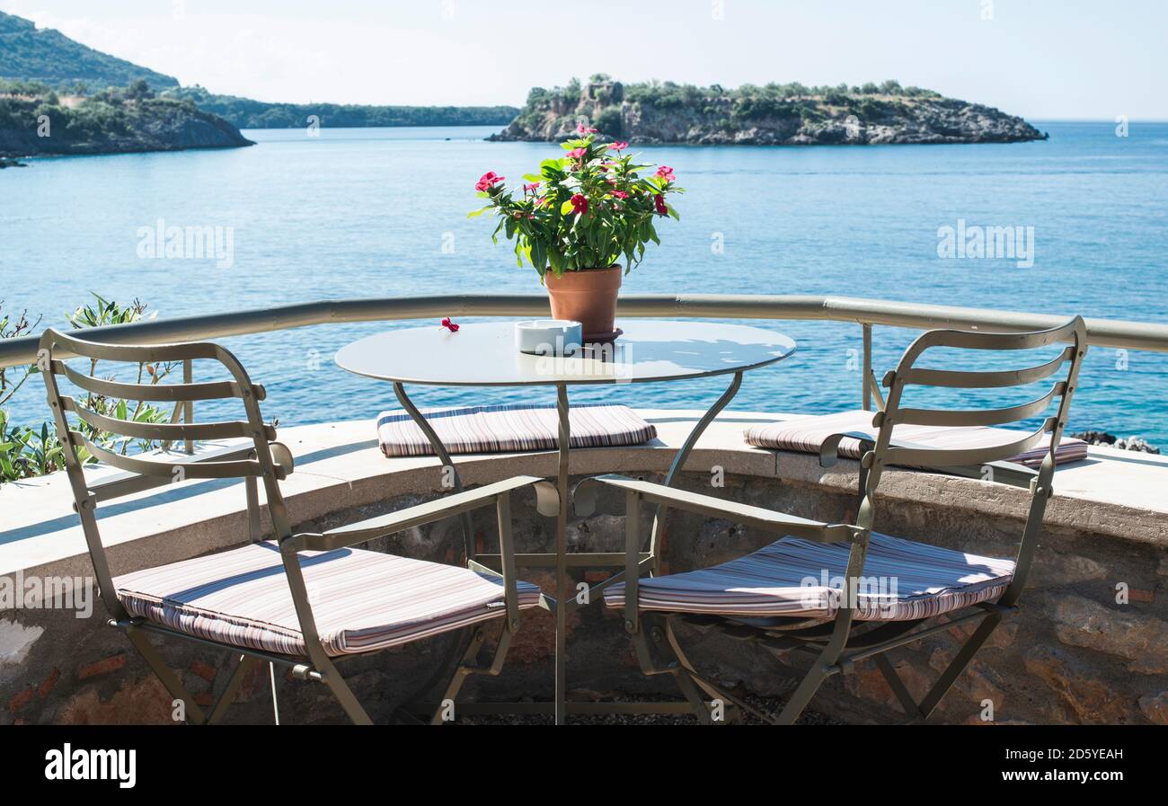Greece, terrace of a restaurant with view to the sea Stock Photo