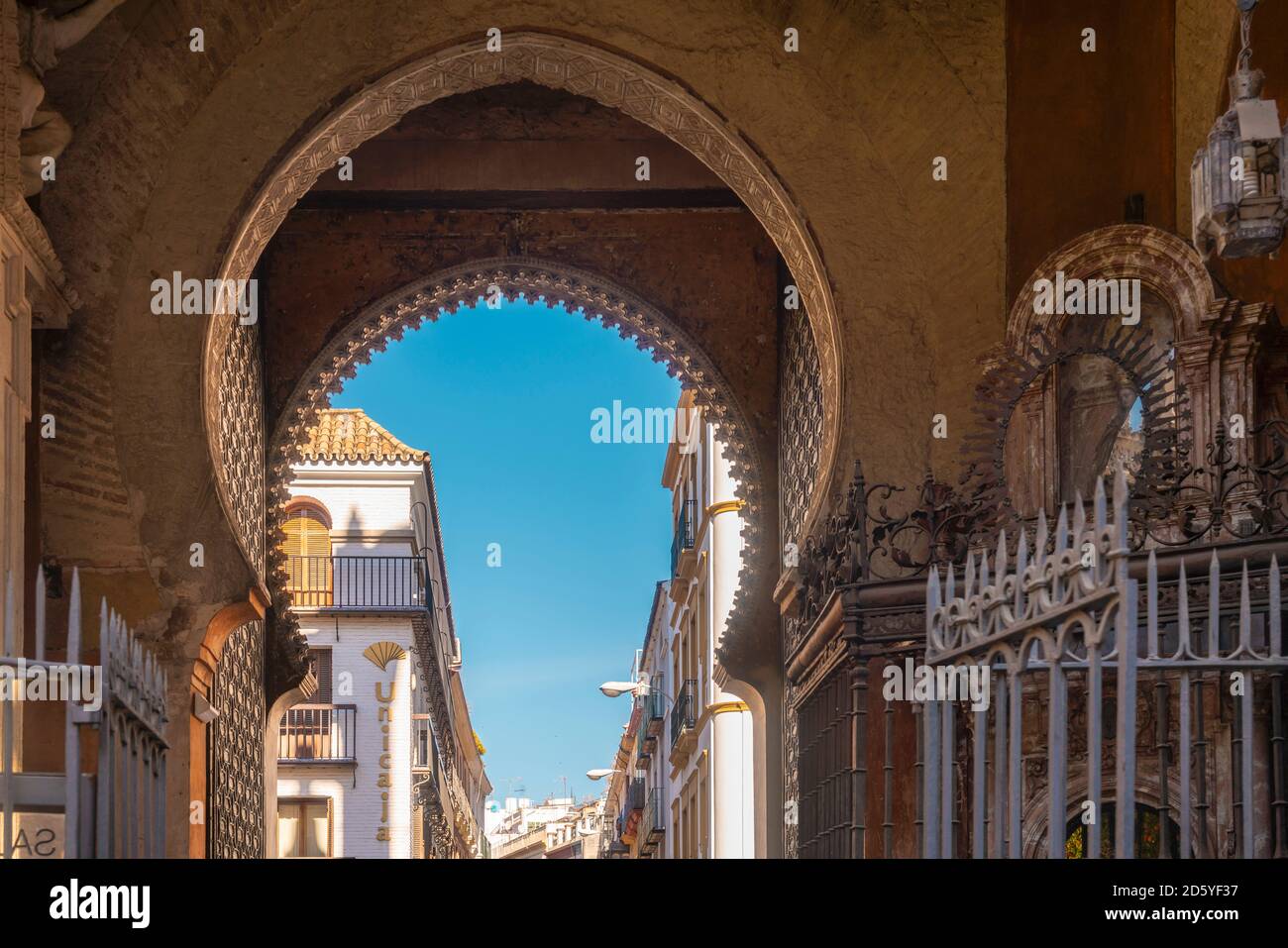 A historic moorish gate close to the Cathedral of Seville, Seville, Spain Stock Photo