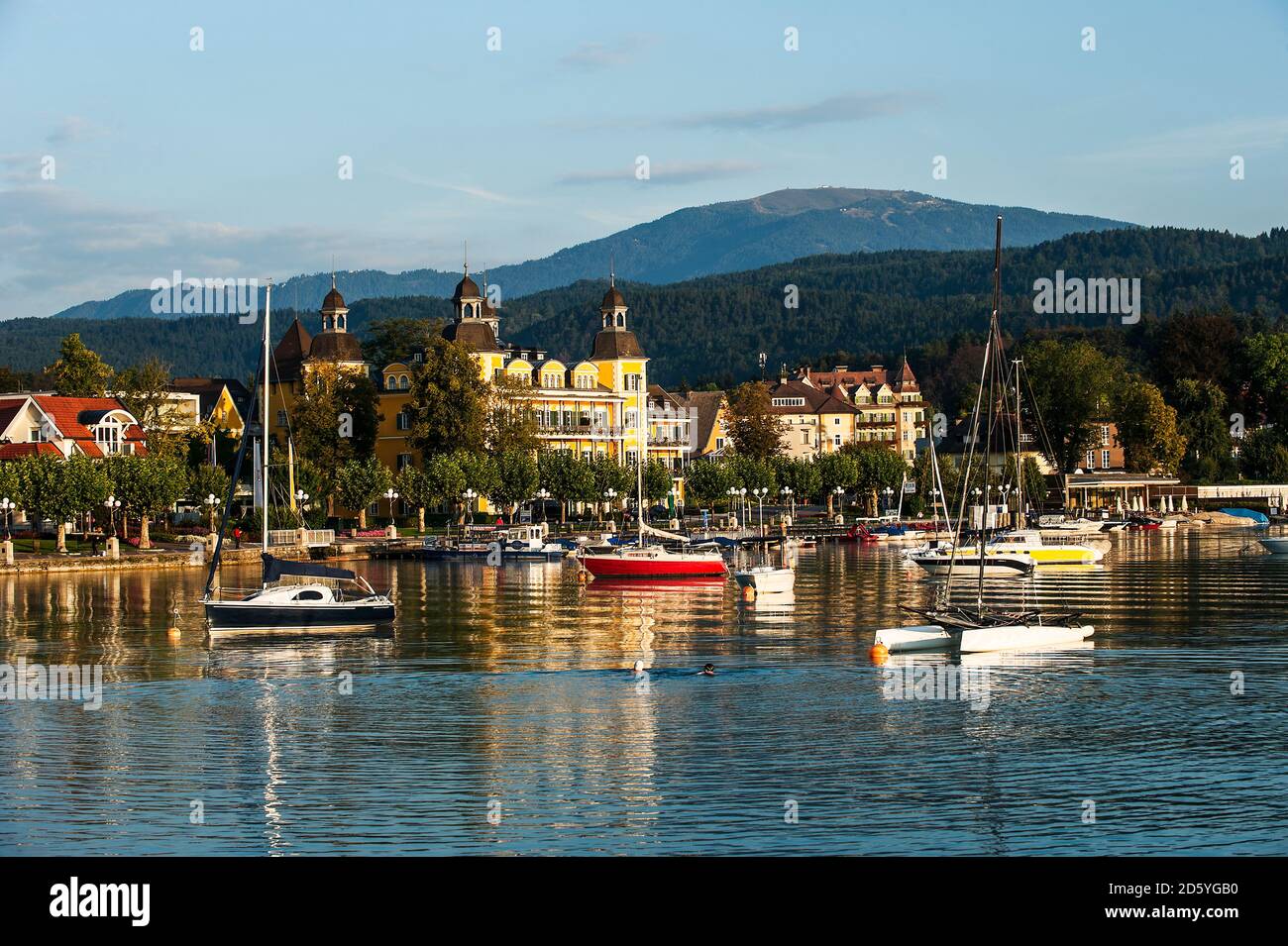 Austria, Carinthia, Velden with Castle Hotel at Lake Woerthersee Stock ...