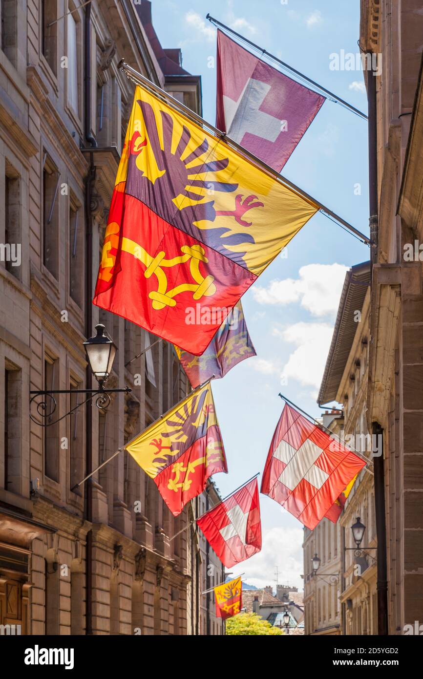 Switzerland, Geneva, Rue de Hotel de Ville, flags of city, canton and state Stock Photo