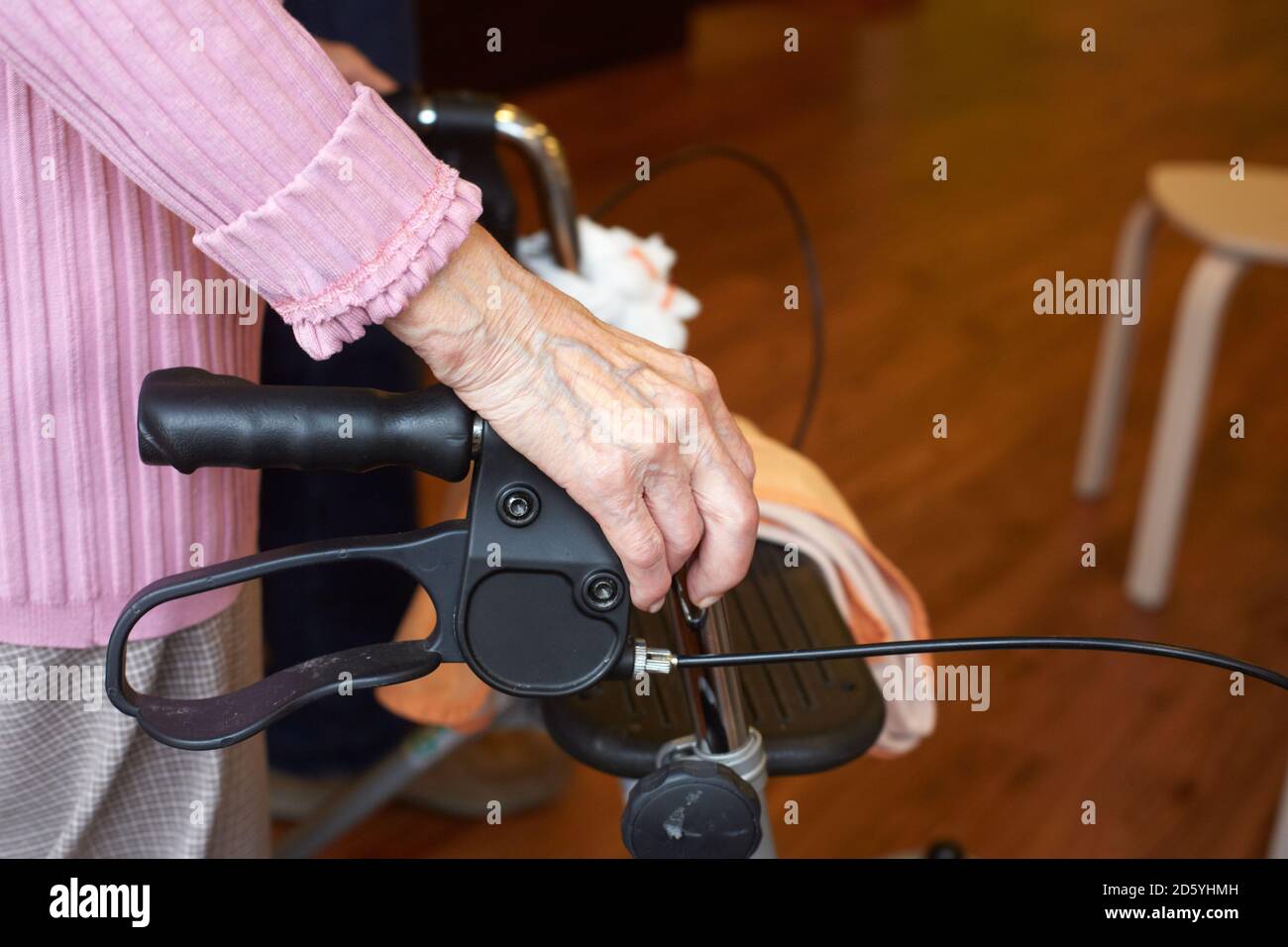 Elderly senior woman pushing walker hi-res stock photography and images ...