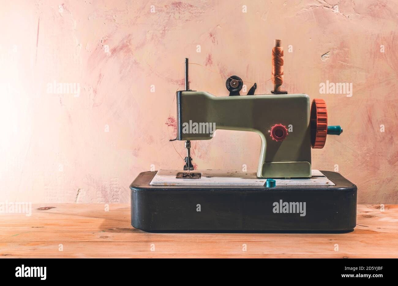 Vintage toy sewing machine Stock Photo Alamy