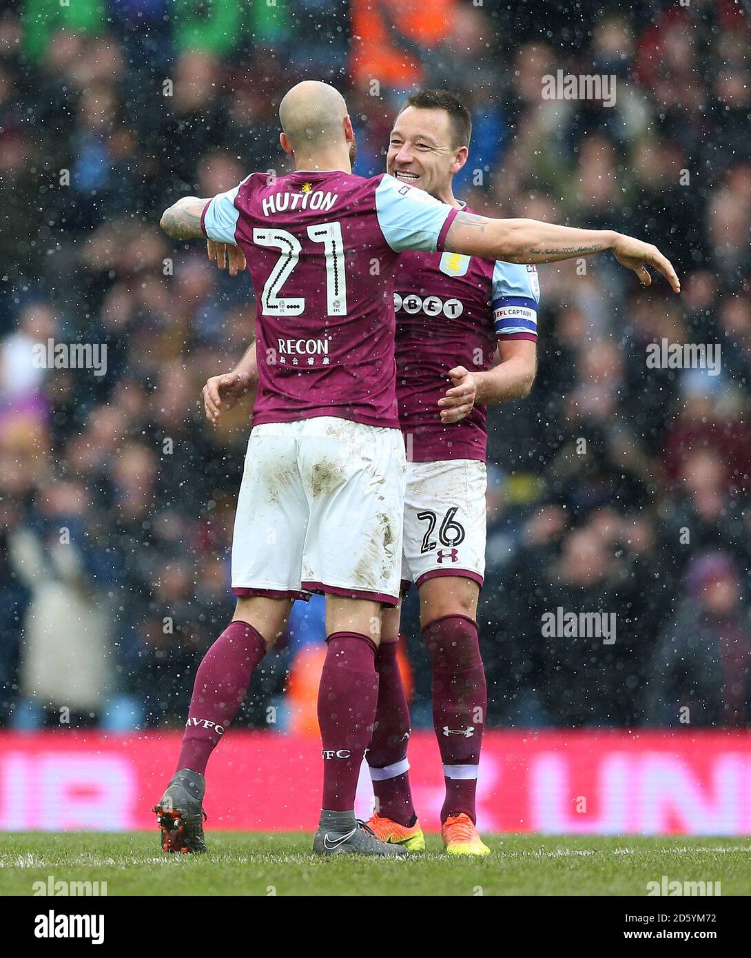 Aston Villa's John Terry (facing) and Alan Hutton celebrate after the final whistle Stock Photo