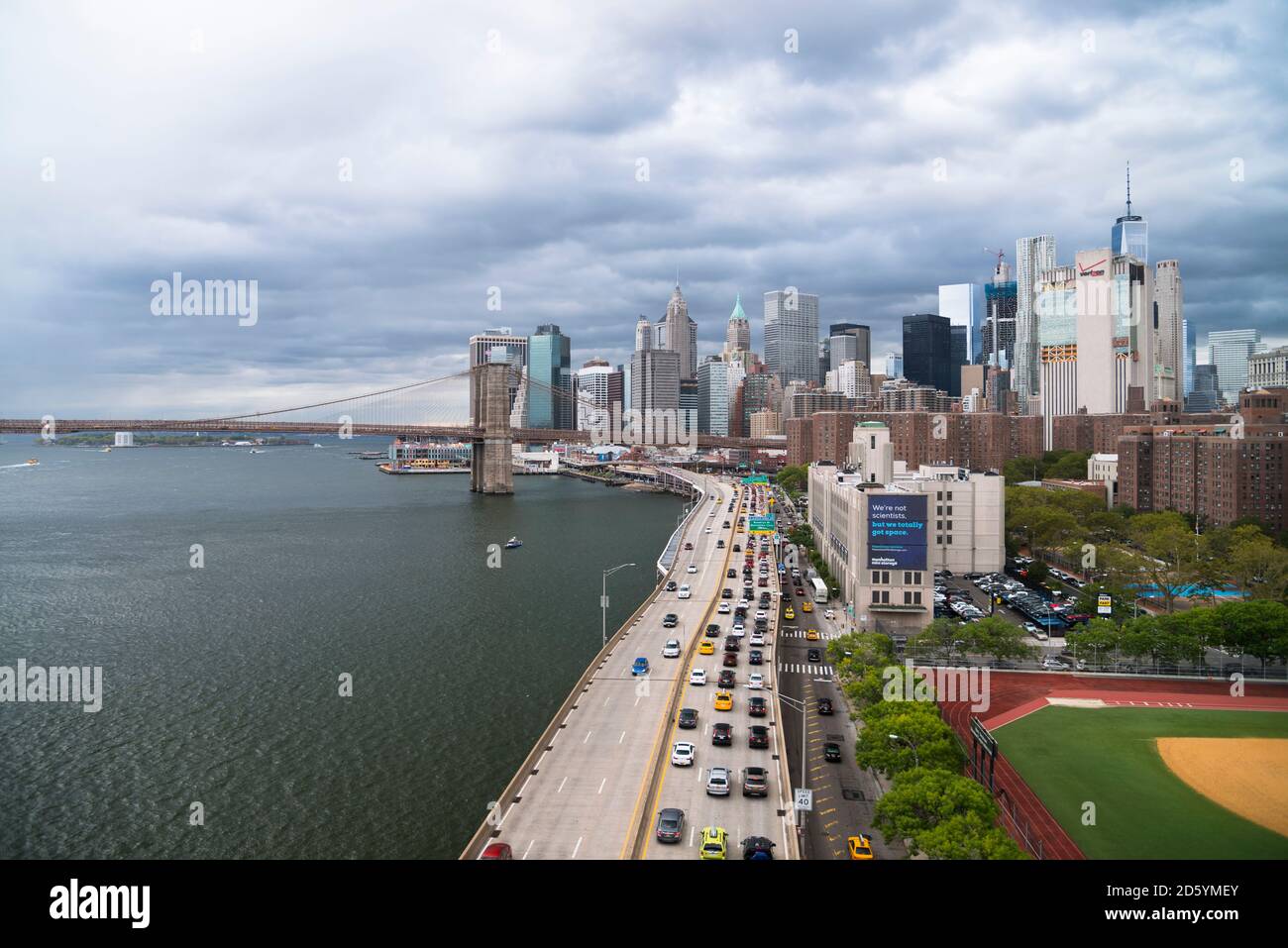 USA, New York City, FDR Drive with Brooklyn Bridge in background Stock Photo