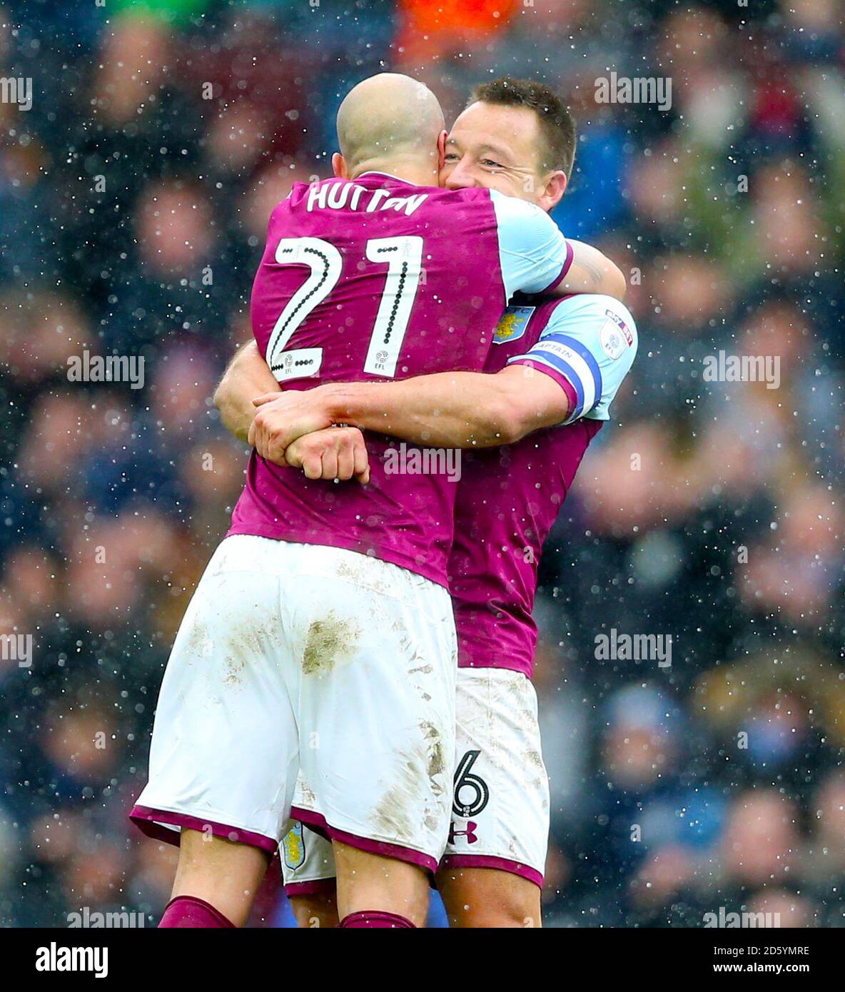 Aston Villa's John Terry (facing) and Alan Hutton celebrate after the final whistle Stock Photo