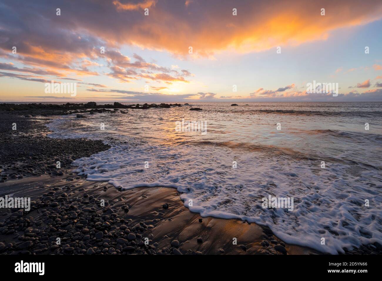 Spain, Canary Islands, La Gomera, Valle Gran Rey, evening at shingle beach Stock Photo