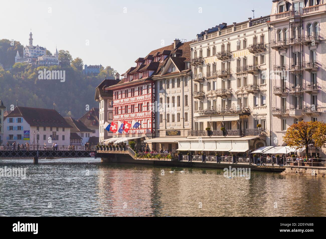 Switzerland, Luzern, hotels and outdoor gastronomy at riverside of Reuss Stock Photo
