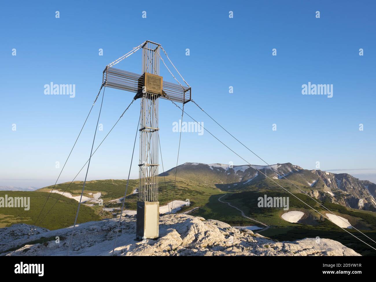Austria, Lower Austria, Vienna Alps, Summit cross on Waxriegel, Schneeberg in the background Stock Photo
