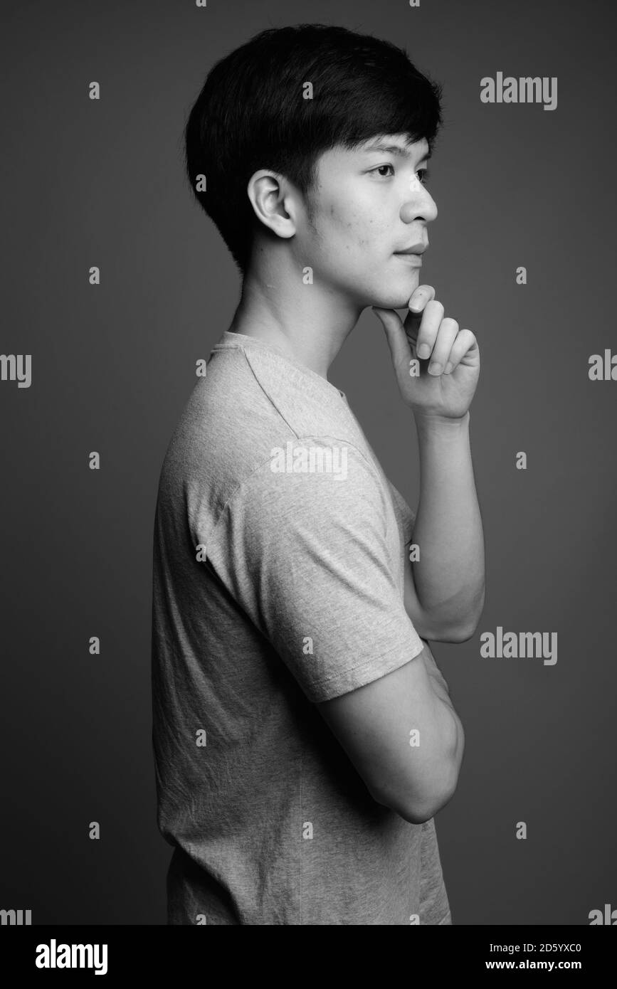Handsome asian guy profile Black and White Stock Photos & Images - Alamy